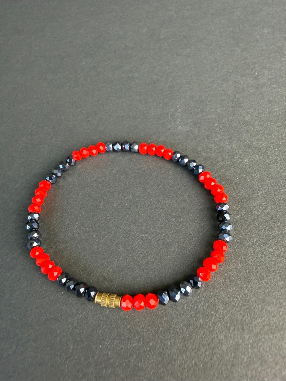 Red and Black Faceted Bead Stretch Bracelet with Gold Accent